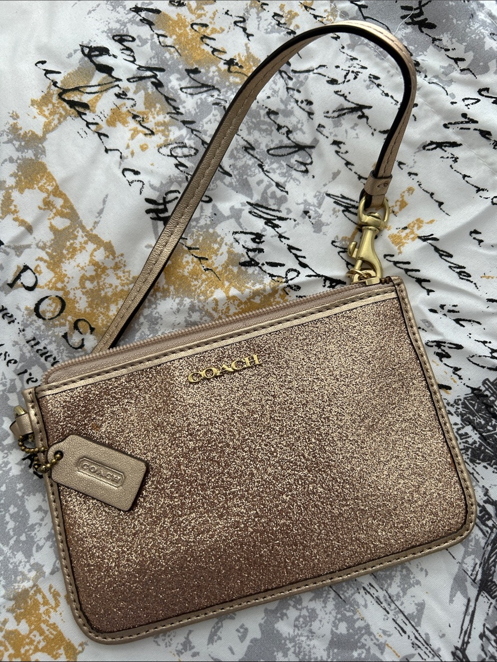 Coach Rose Gold Glitter Wristlet with Gold Hardware